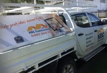 Parked White Pickup Truck — Licensed Builders in Rockhampton, QLD