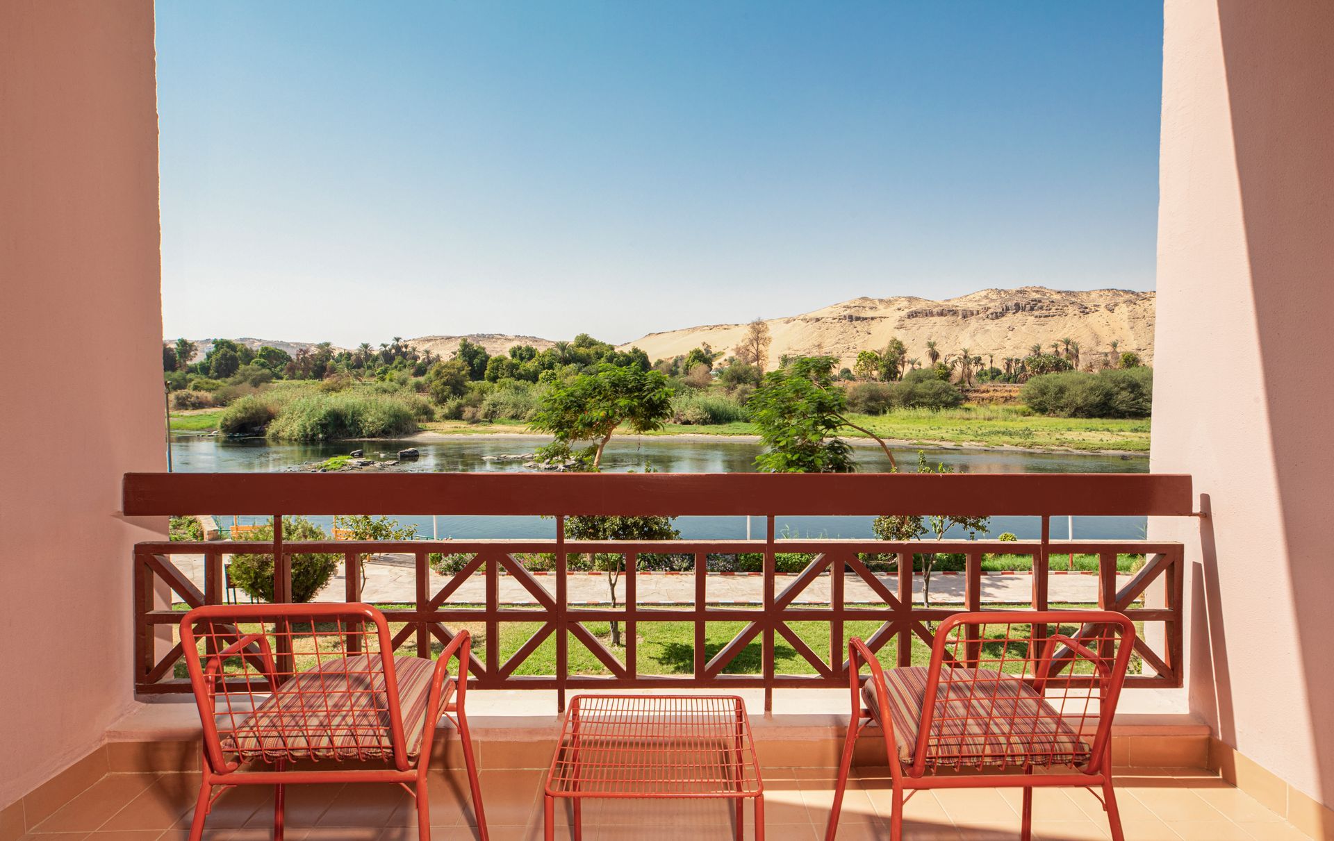 Pyramisa Island Hotel Aswan — elegant façade and pools along the Nile