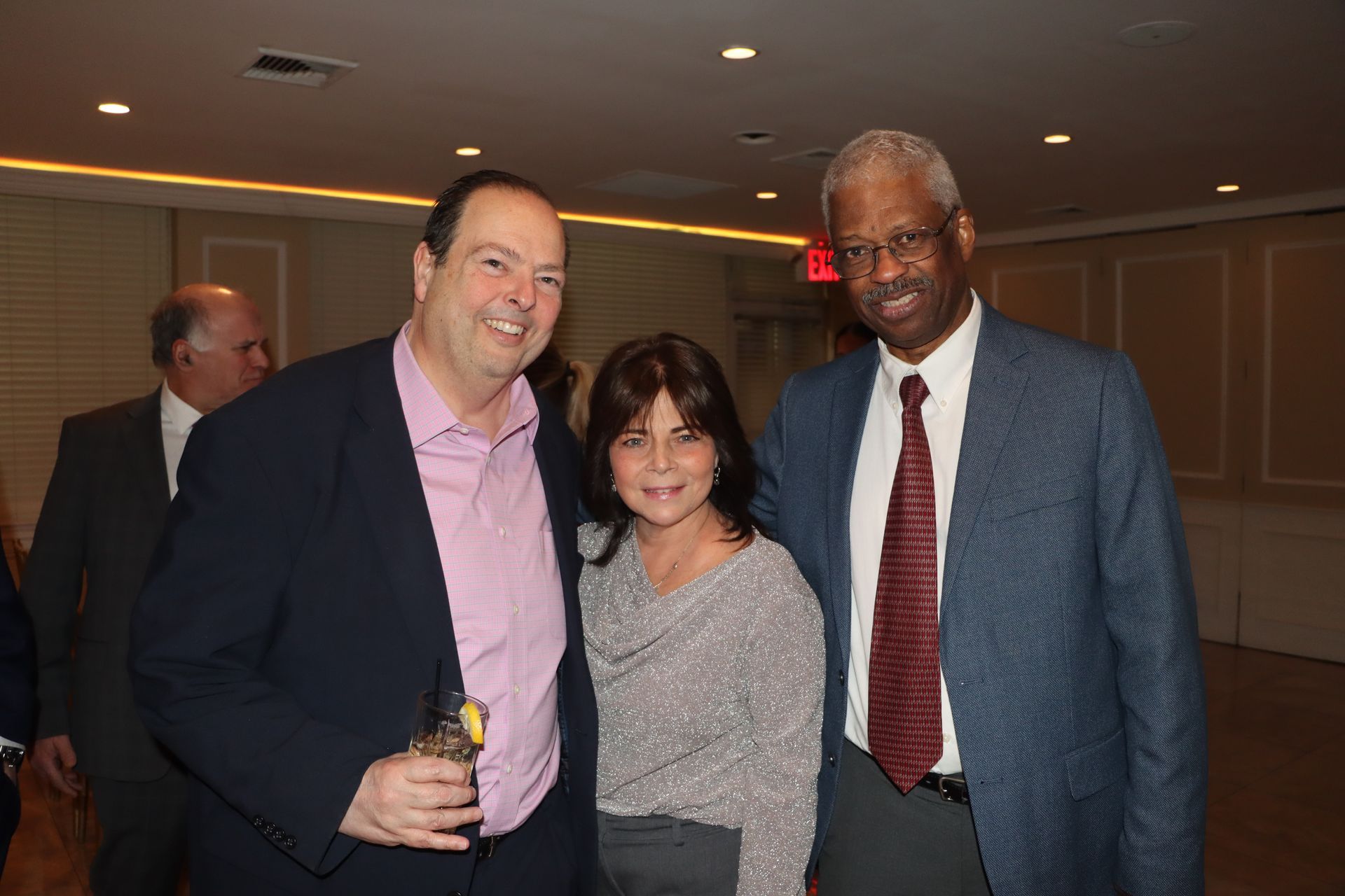 Three People are Posing for a Picture in a Room — Staten Island, NY — RICHMOND COUNTY BAR ASSOCIATION