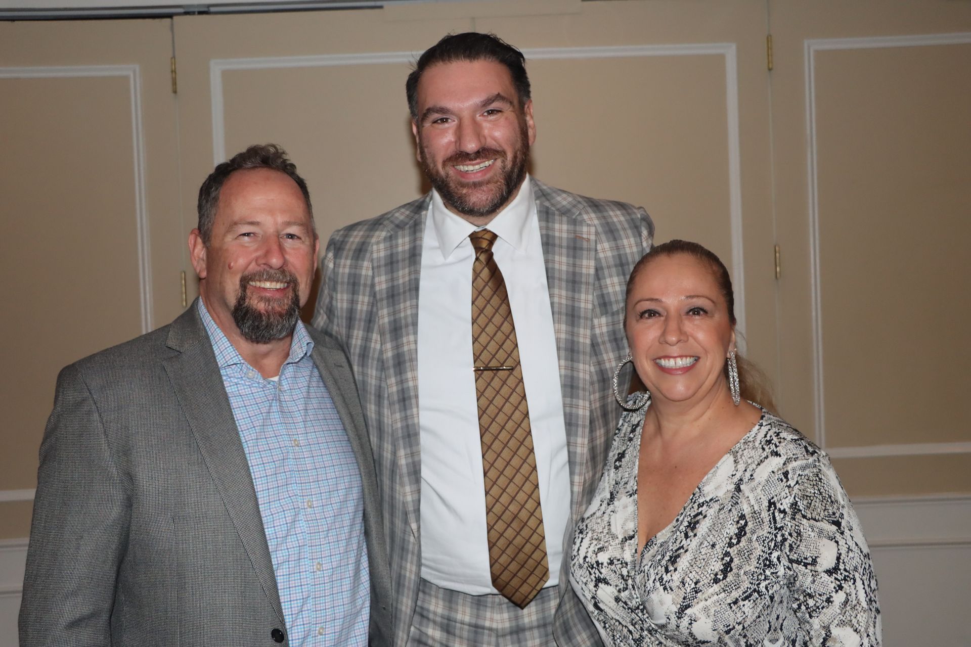 A Man in a Suit is Posing for a Picture with Two Other People — Staten Island, NY — RICHMOND COUNTY BAR ASSOCIATION