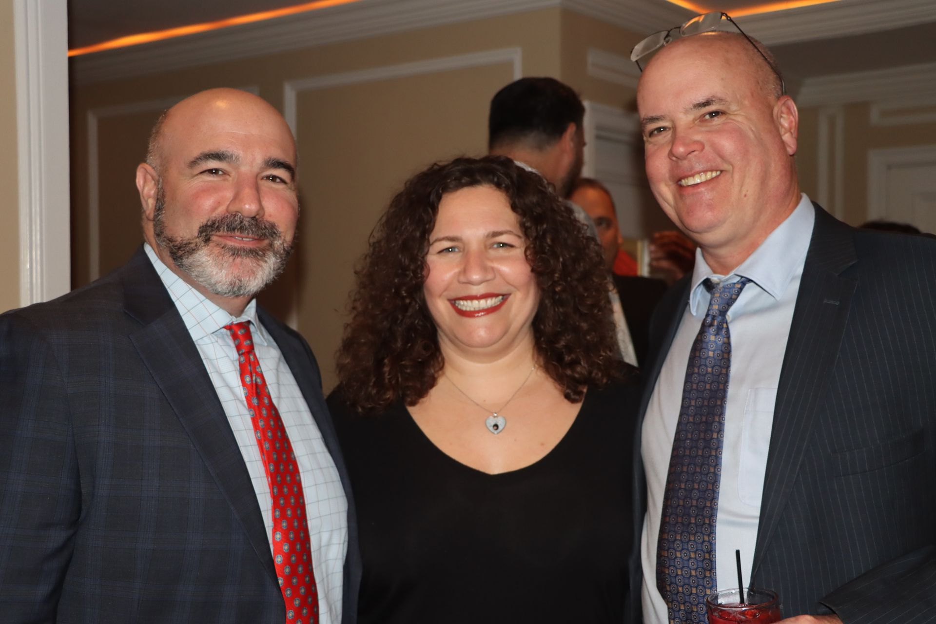 Two Man With A Woman While Taking A Picture | Staten Island, NY | RCBA