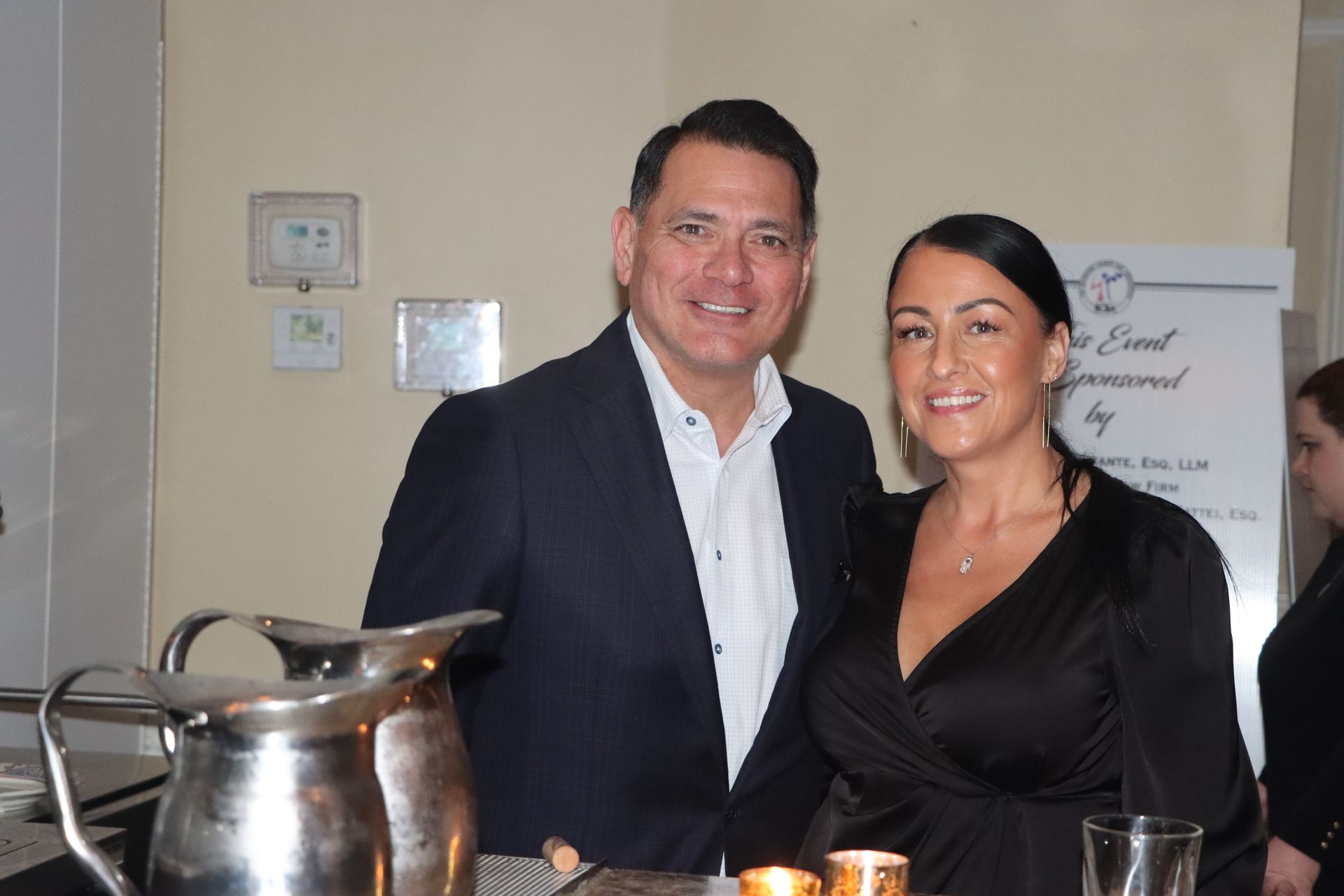 Two People Near a Pitcher — Staten Island, NY — RICHMOND COUNTY BAR ASSOCIATION