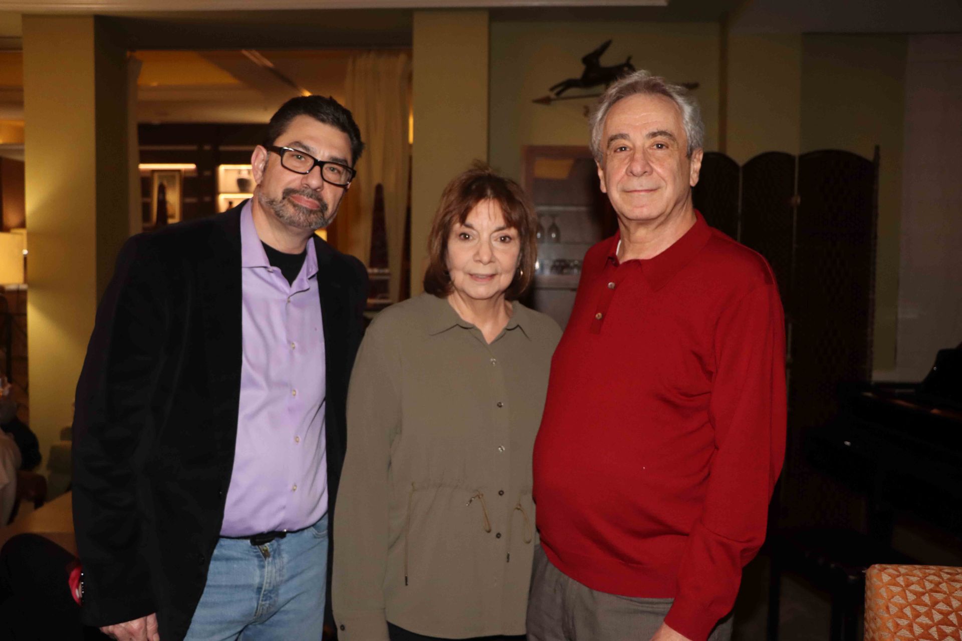 Three People Are Posing For A Picture Together In A Living Room | Staten Island, NY | RCBA