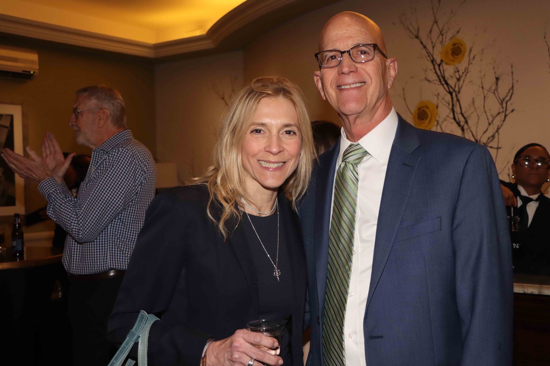 A Man And A Woman Are Posing For A Picture In A Room | Staten Island, NY | RCBA