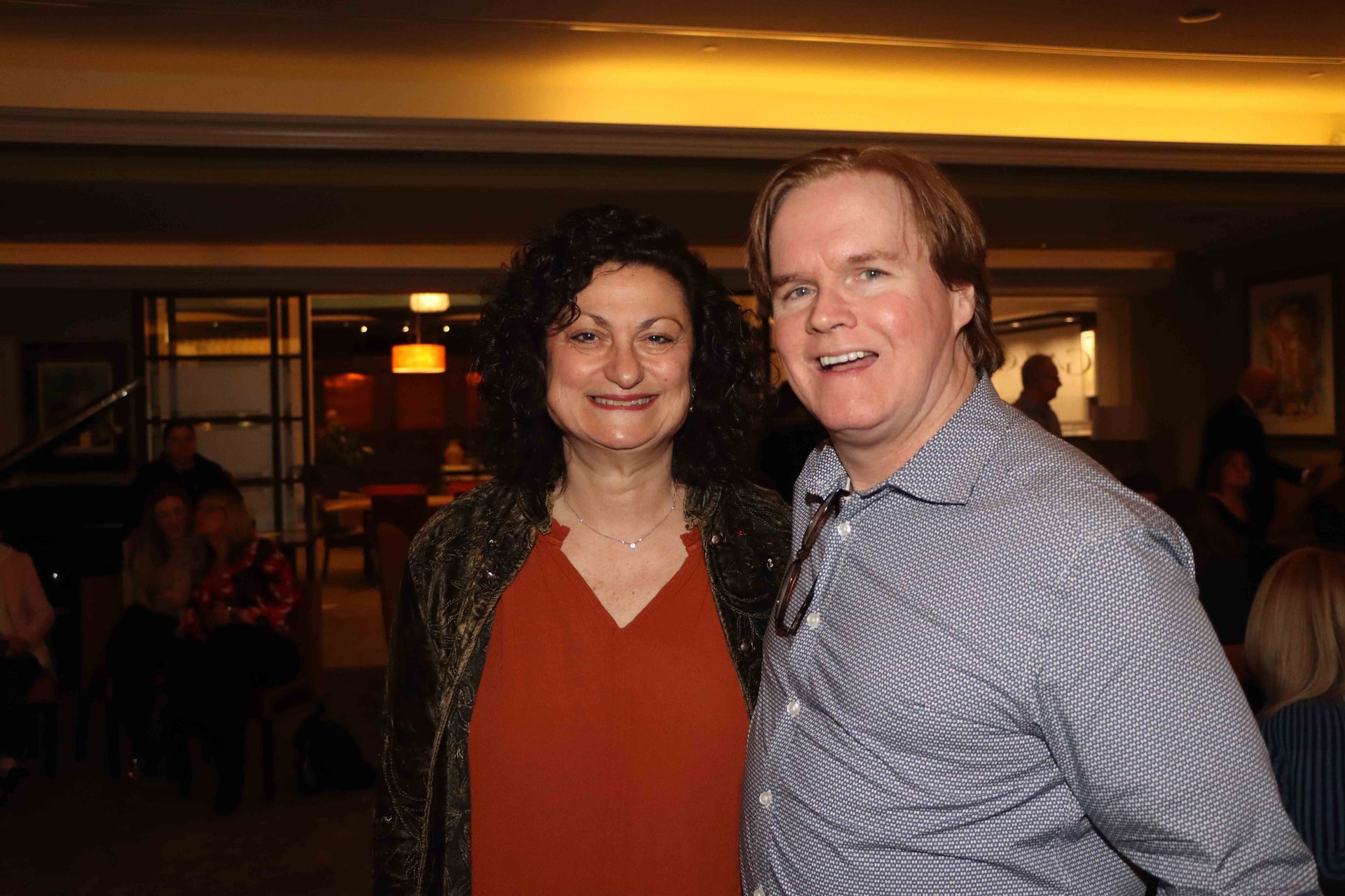 A Man And A Woman Are Posing For A Picture In A Room | Staten Island, NY | RCBA