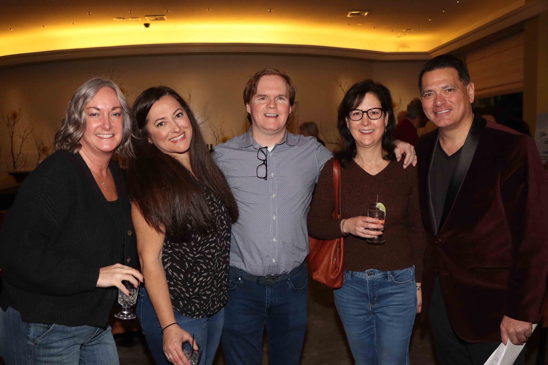 A Group Of People Are Posing For A Picture In A Room | Staten Island, NY | RCBA