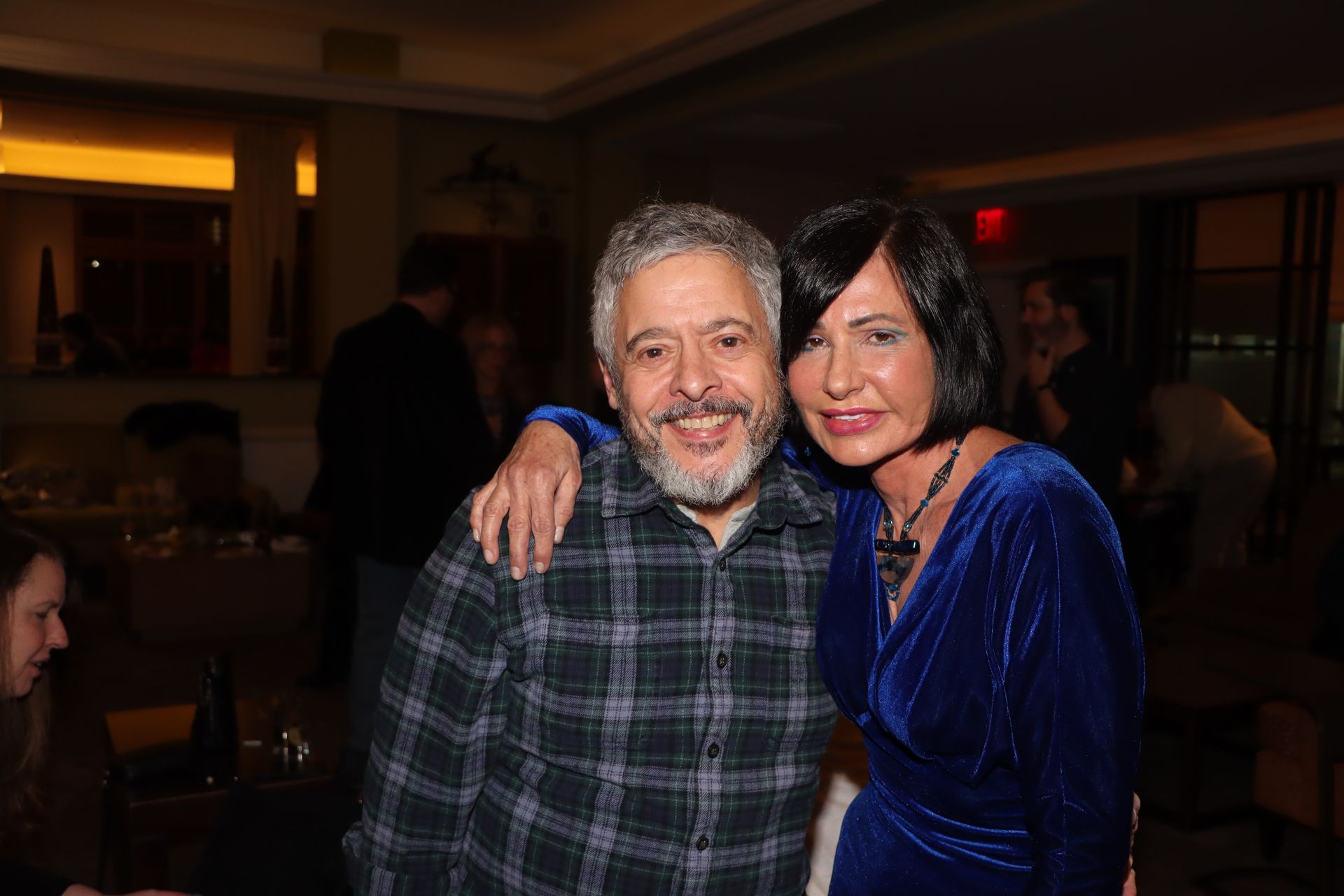 A Man and a Woman Are Posing for a Picture in a Room | Staten Island, NY | RCBA