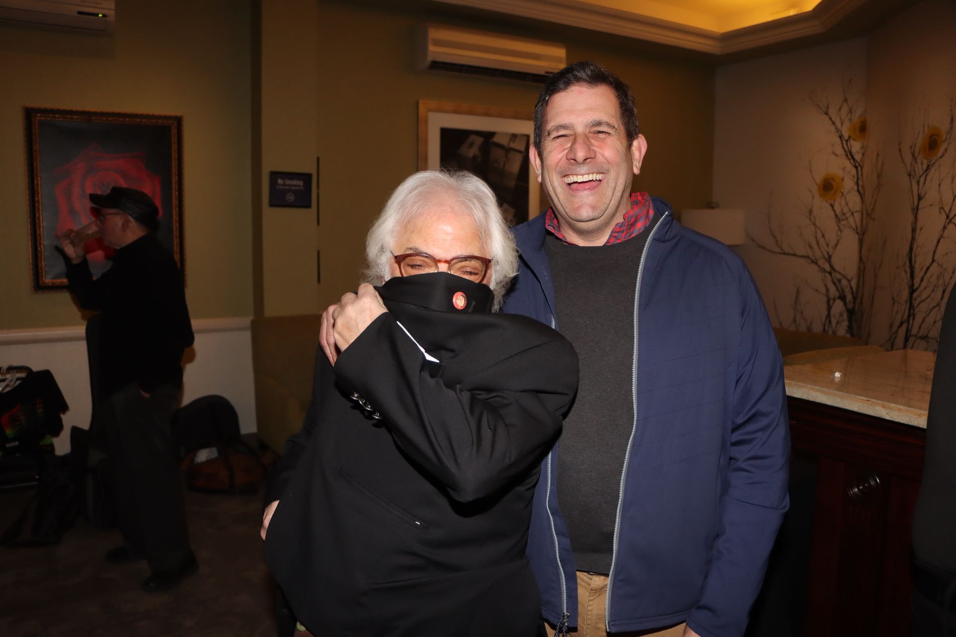Two Men Are Posing for a Picture in a Room and One of Them is Wearing a Mask | Staten Island, NY | RCBA