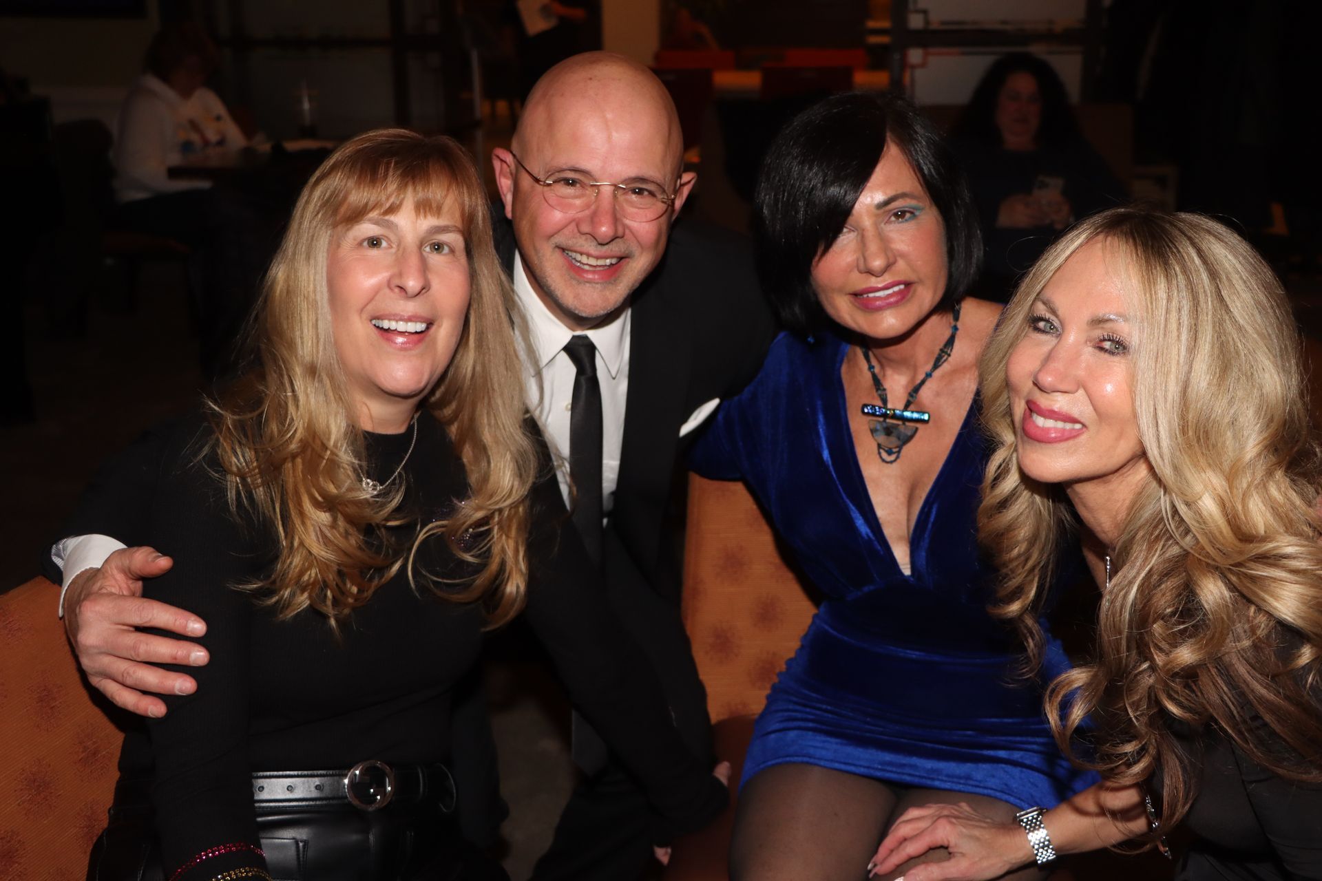 A Man and Three Women arePosing for a Picture Together — Staten Island, NY — RICHMOND COUNTY BAR ASSOCIATION
