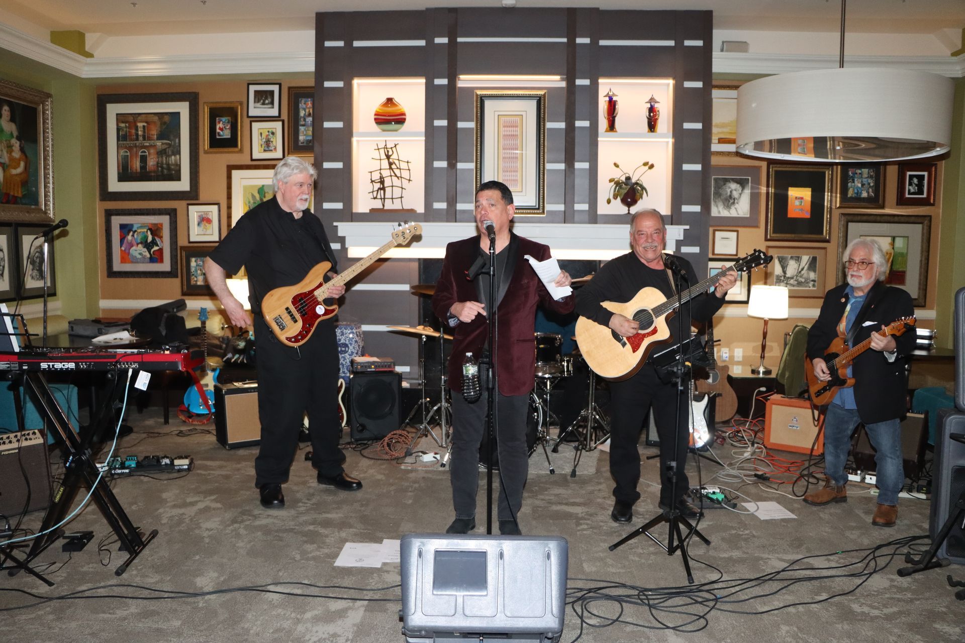 A Group of Men are Playing Guitars and Singing into Microphones — Staten Island, NY — RICHMOND COUNTY BAR ASSOCIATION