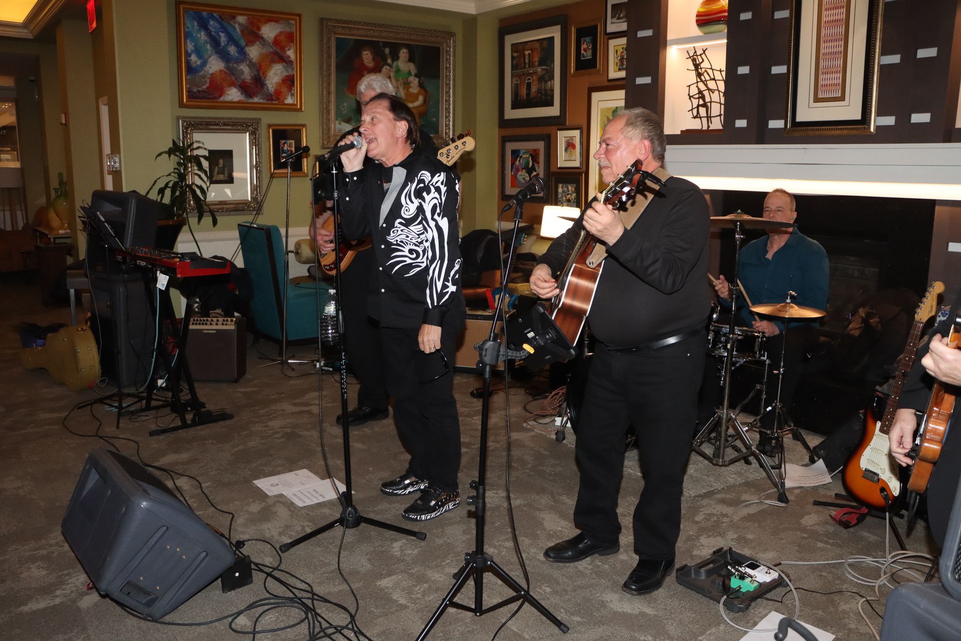 A Group of Men Playing Guitars and Singing into Microphones — Staten Island, NY — RICHMOND COUNTY BAR ASSOCIATION