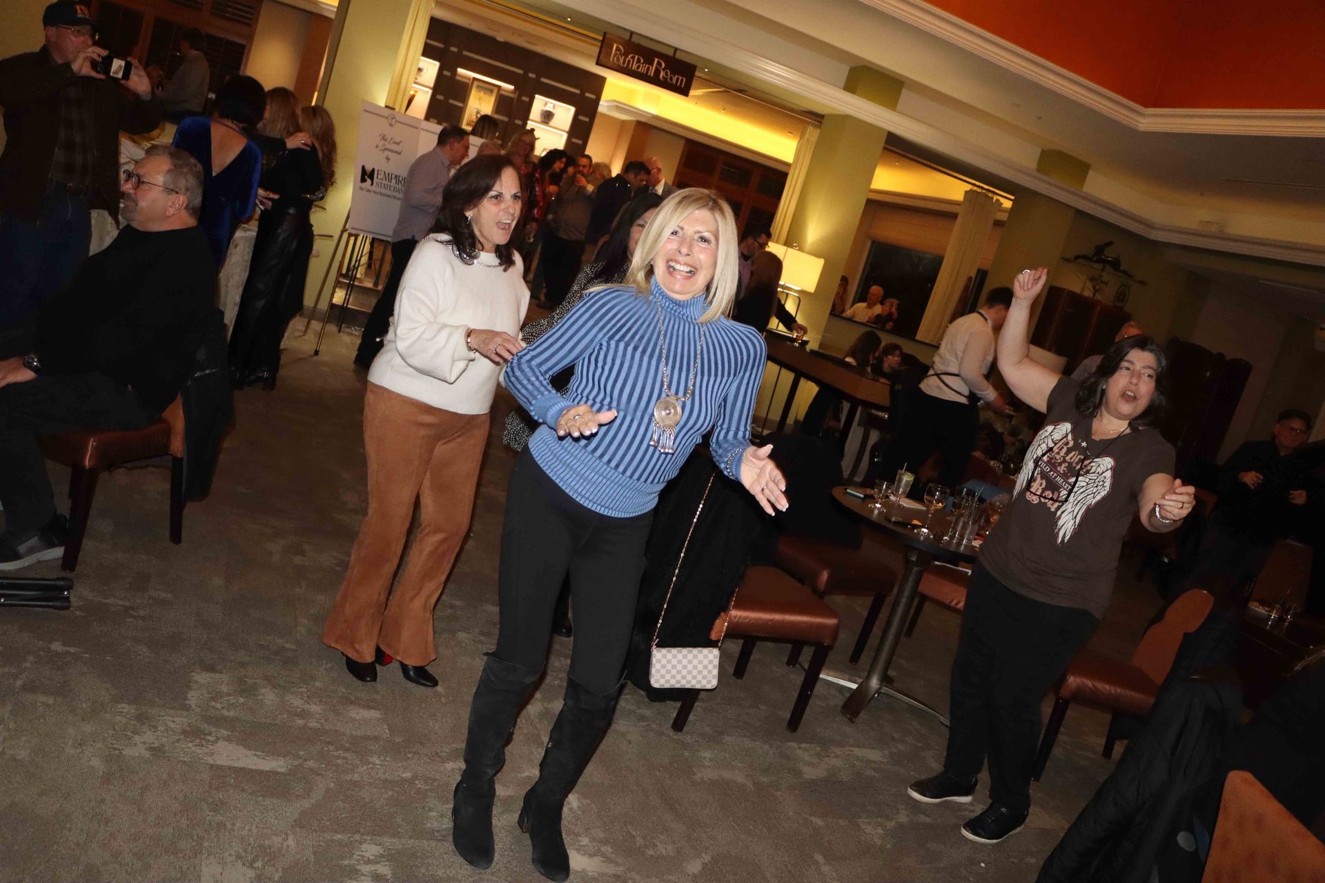 A Group Of People Are Dancing In A Room | Staten Island, NY | RCBA