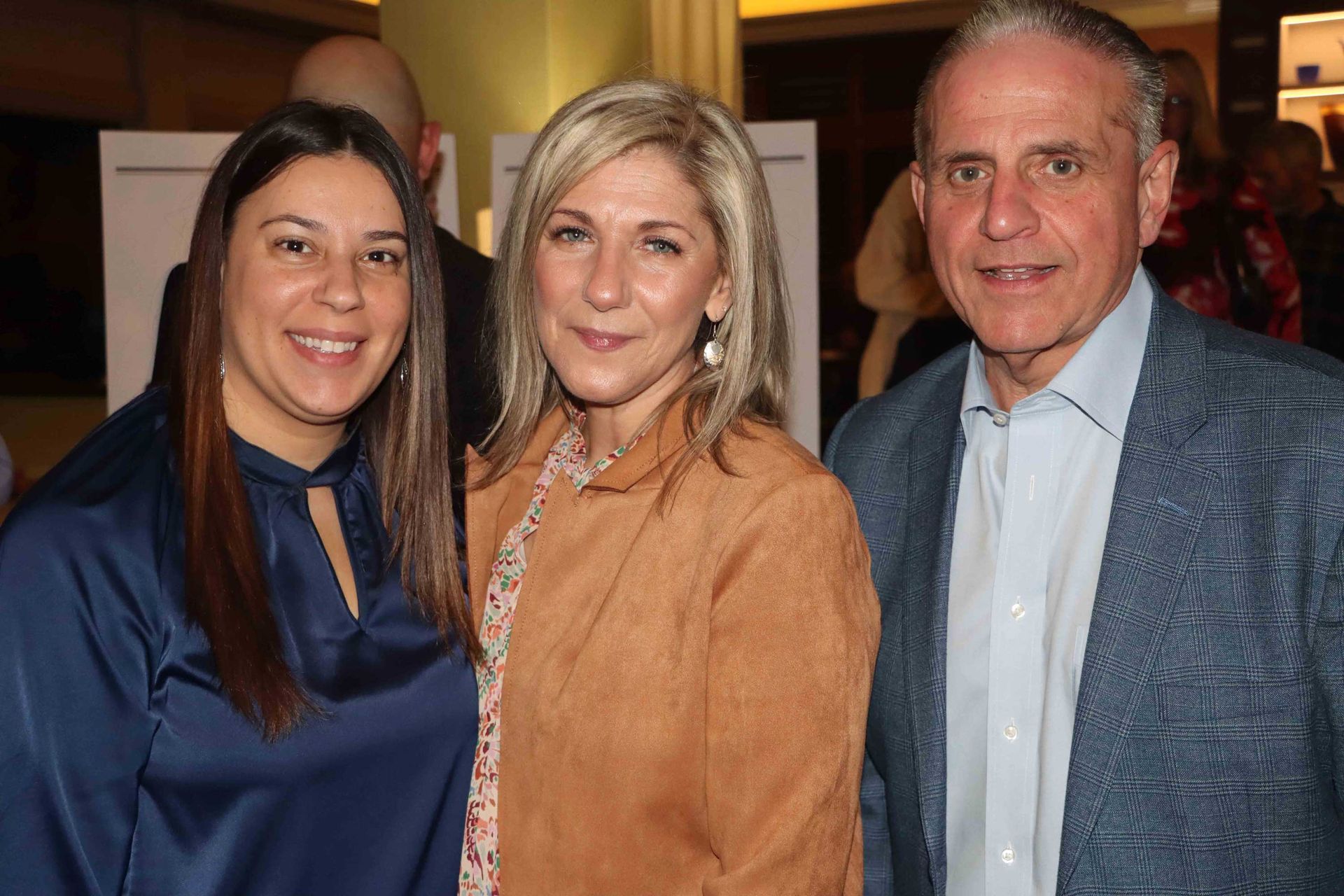 Three People Are Posing For A Picture Together In A Room | Staten Island, NY | RCBA