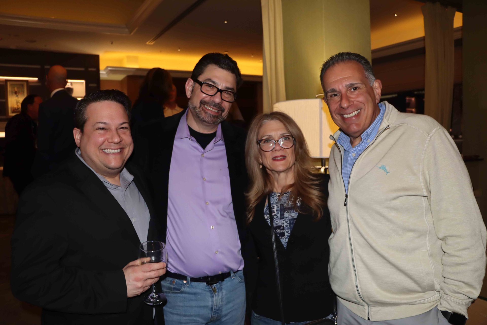 A Group Of People Posing For A Picture In A Room | Staten Island, NY | RCBA