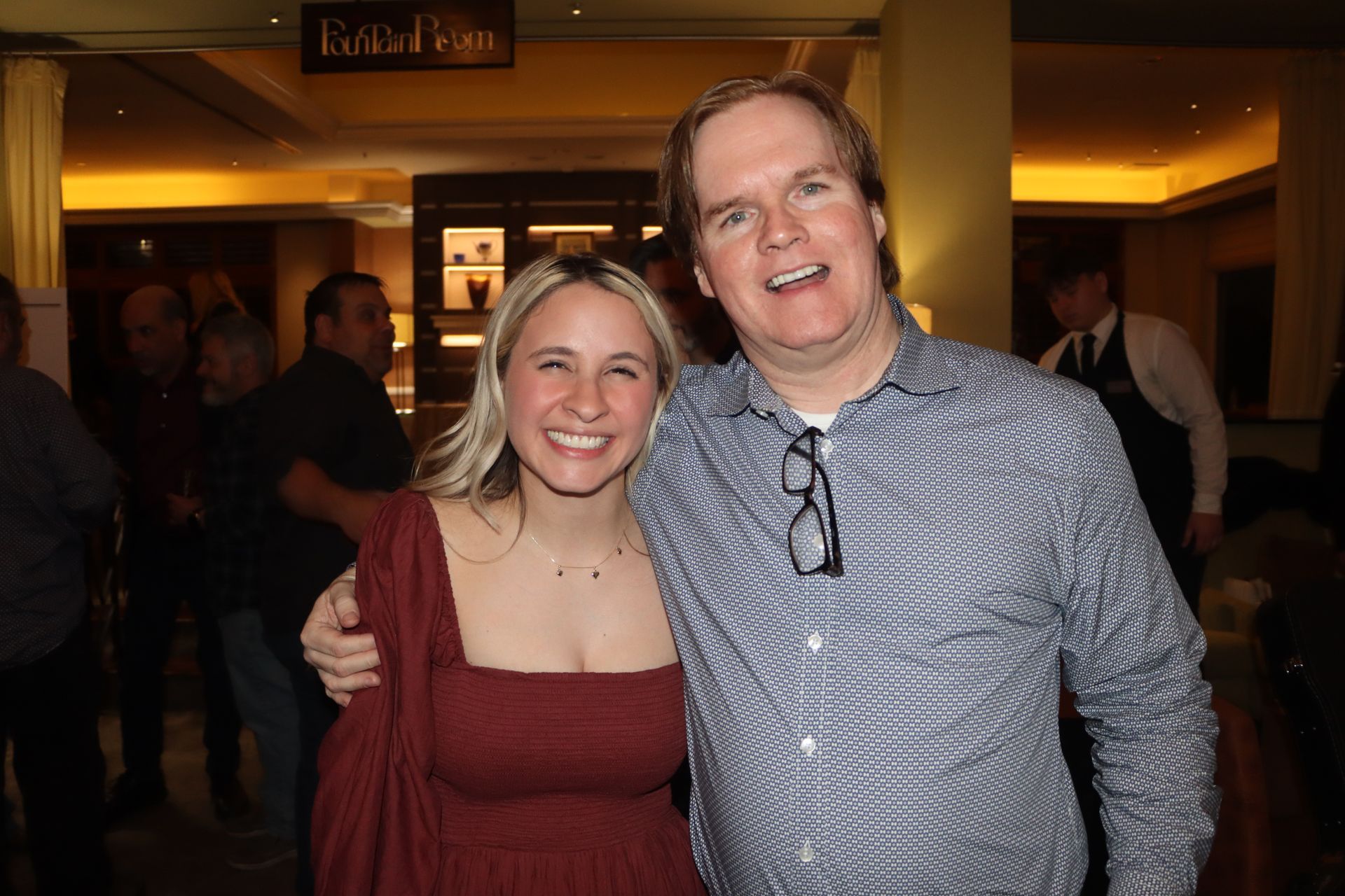 A Man and a Woman Are Posing for a Picture in a Room | Staten Island, NY | RCBA