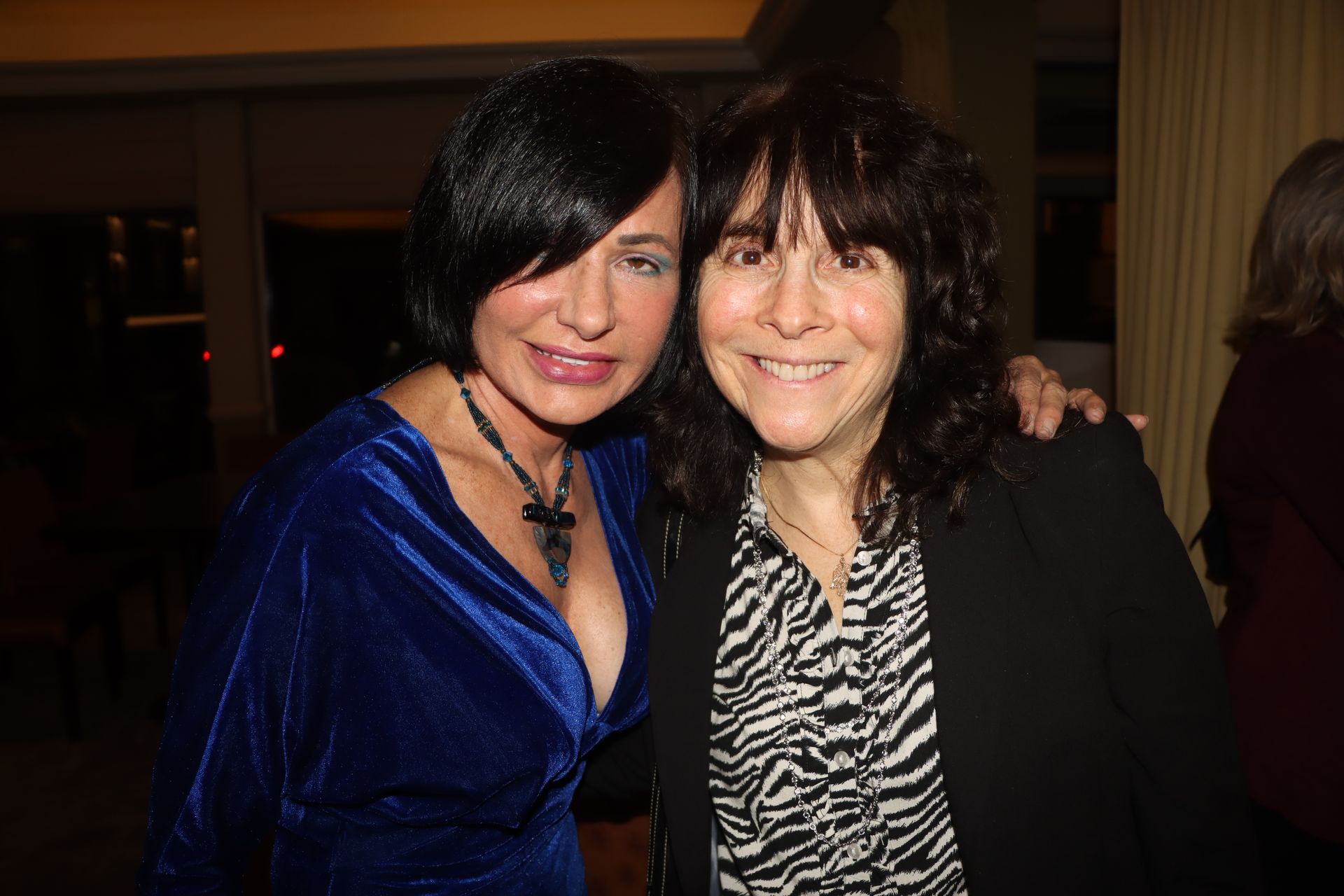 Two Women Are Posing for a Picture Together in a Room | Staten Island, NY | RCBA