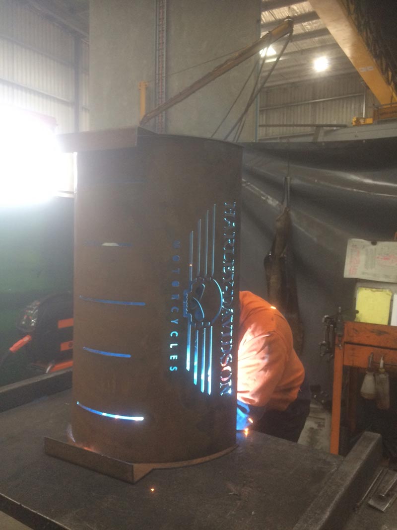 man working on a metal