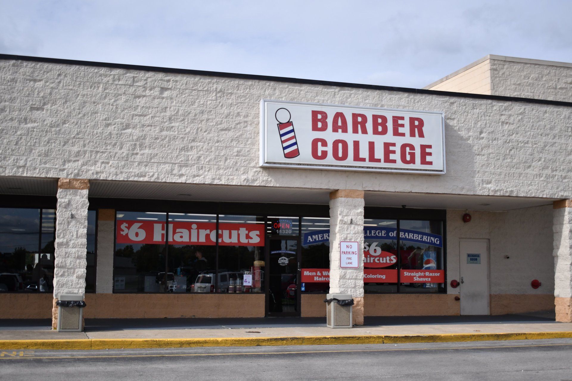 A barber college with a sign that says barber college