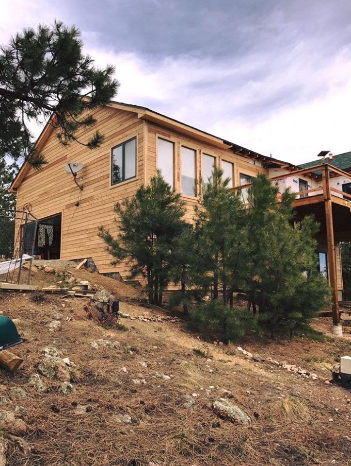 House Made of Woods — Lakewood, CO — Watershed Roofing & Restoration
