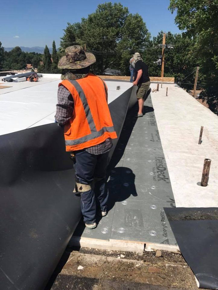 Installing PVC Roof — Lakewood, CO — Watershed Roofing & Restoration