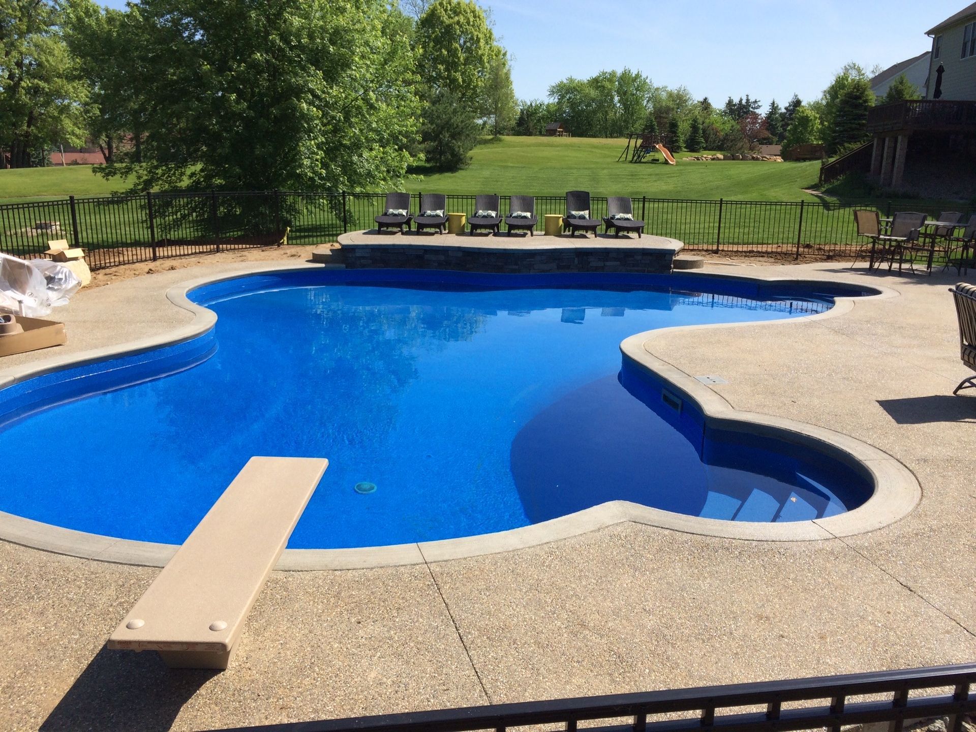 Outdoor In-ground pool with diving board