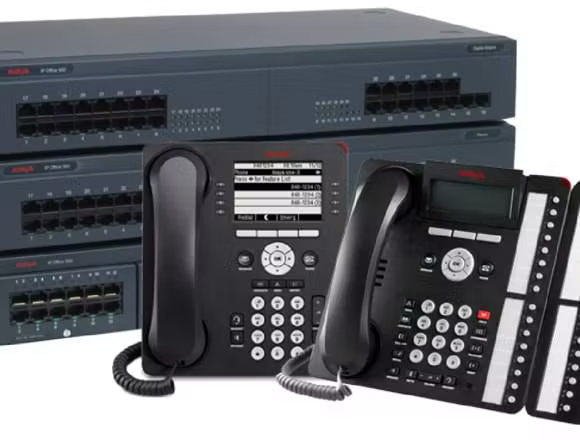Dark gray office phones and server hardware.