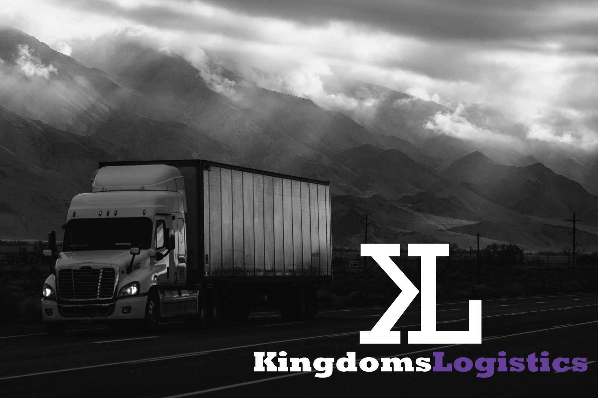 Semi-truck driving on a road in front of mountains. Kingdom's Logistics logo is present.