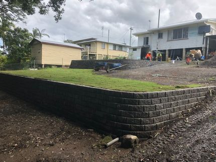 A Fire Pit in the Middle of a Grassy Field — Golden City Gympie Brick & Landscape in Gympie, QLD