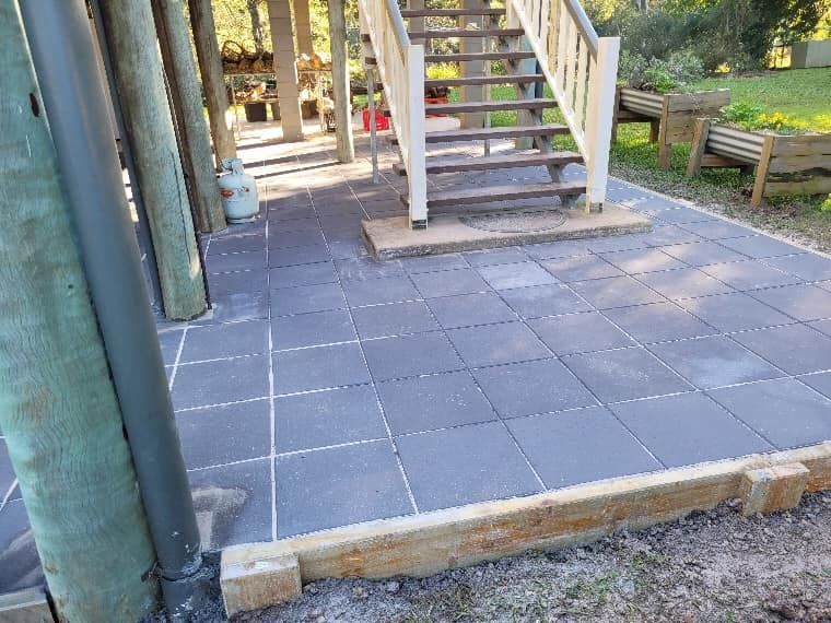 A Patio With Stairs Leading Up to a House — Golden City Gympie Brick & Landscape in Gympie, QLD