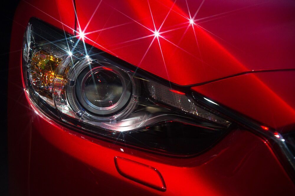 Glittering Shiny Red Car Headlight Projector Lamp — Ceramic Pro in Cardiff