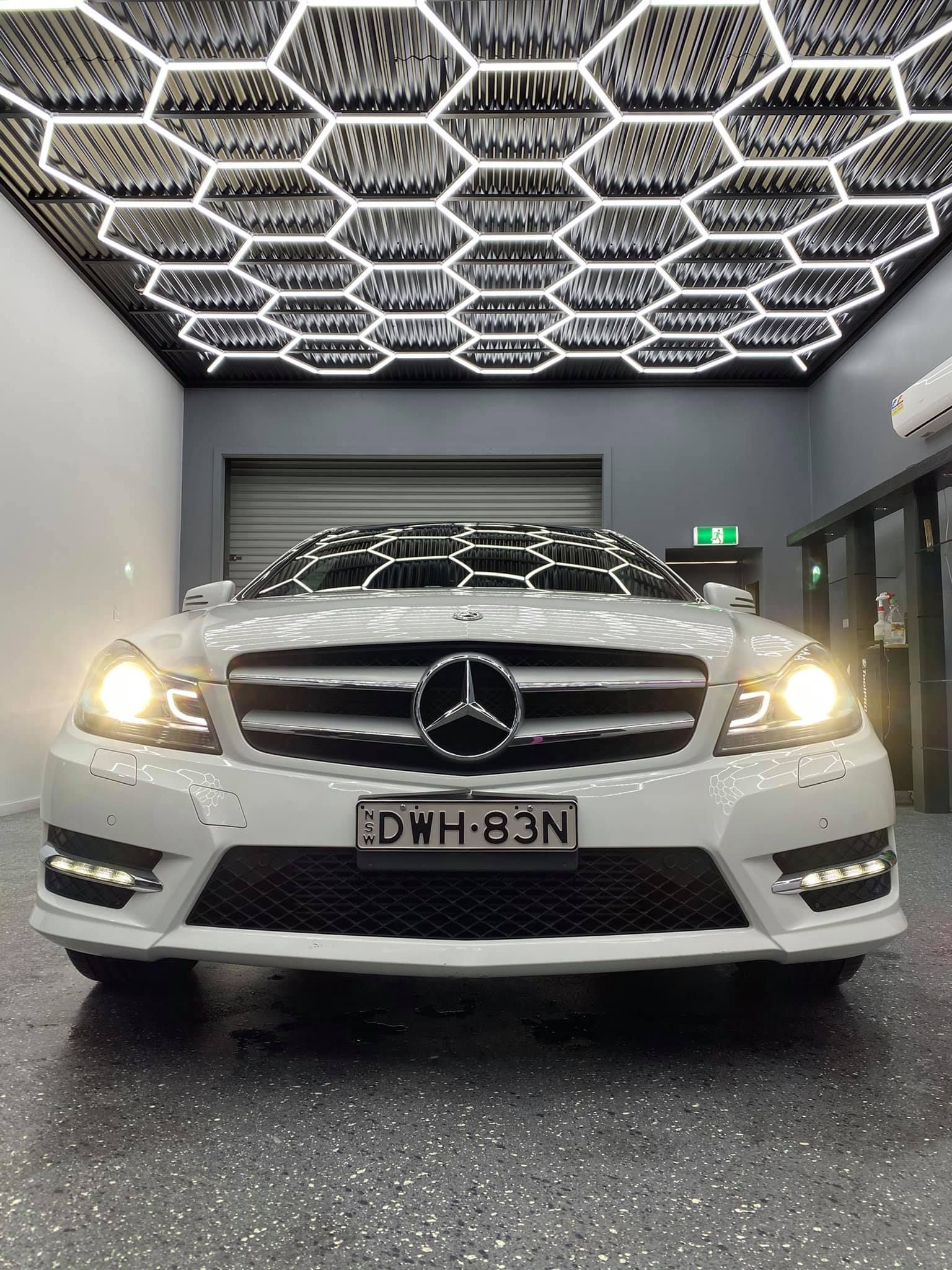 Pristinely cleaned Mercedes in professional detailing garage — Car Detailer in Newcastle