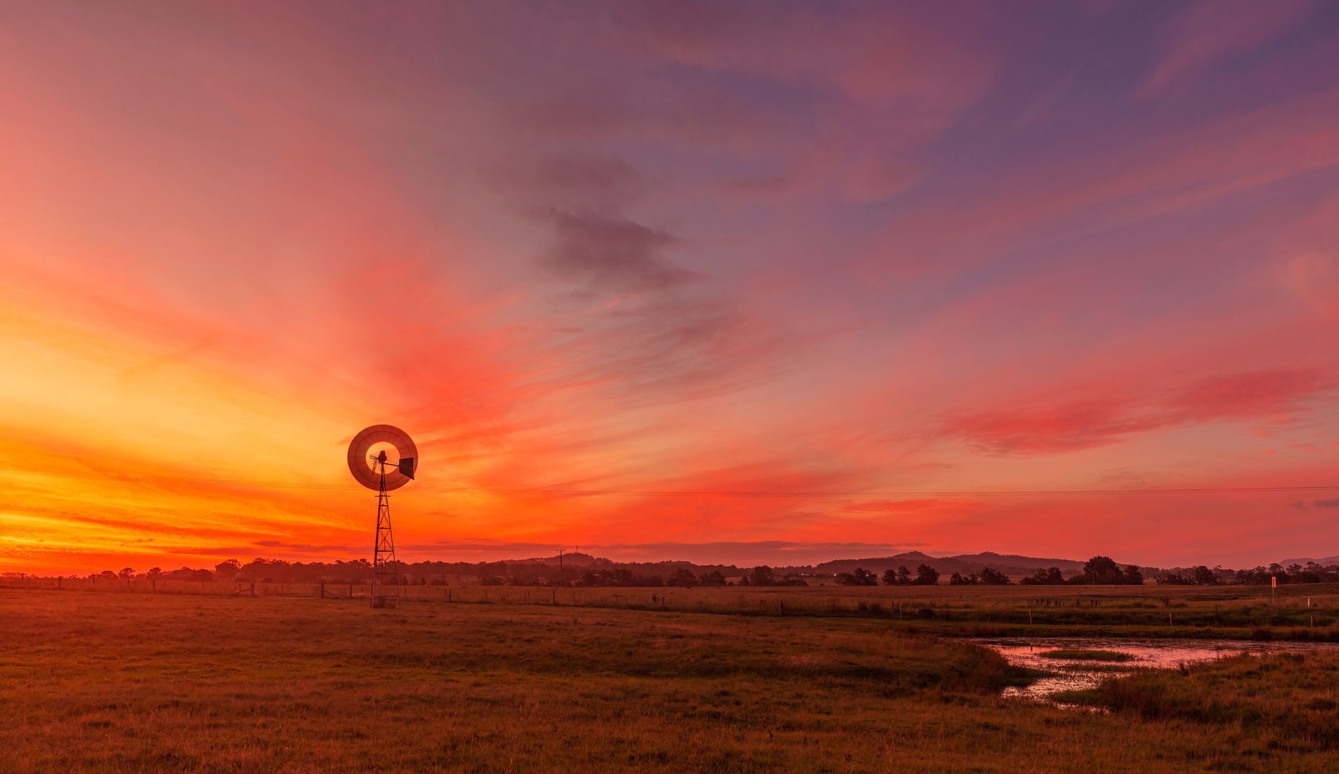 An Aerial View of a Landscape With a Sunset in the Background — VIP Car Care Newcastle in Maitland, NSW