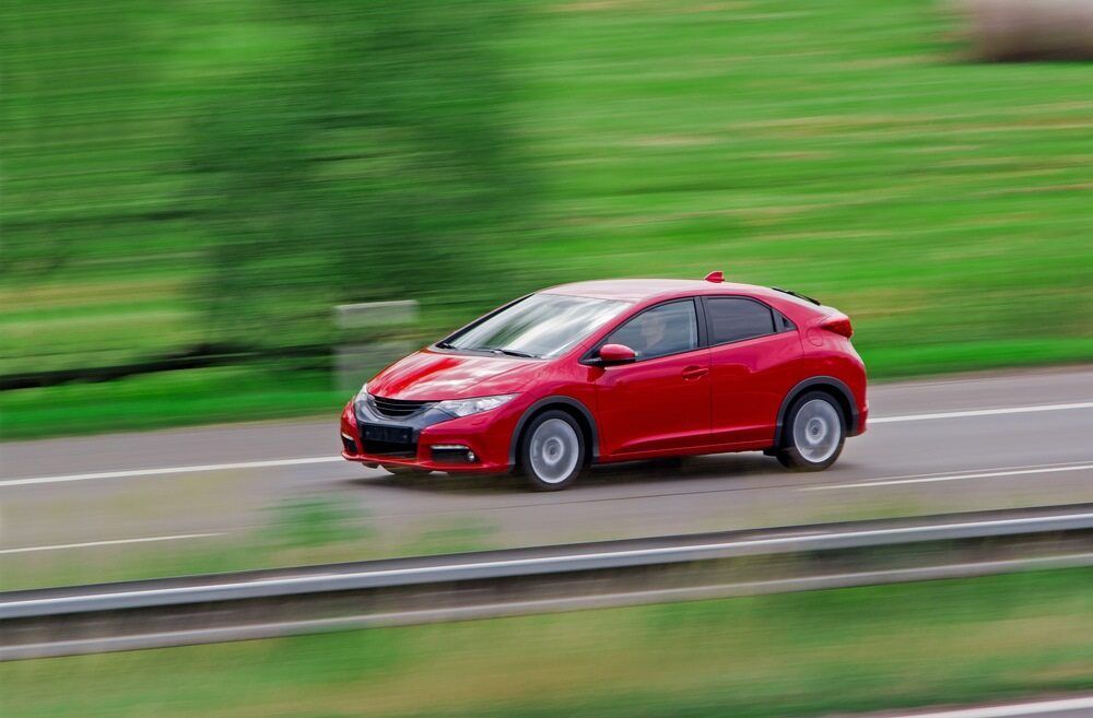 Red Car Captured in High Speed — VIP Car Care Newcastle in Maitland, NSW