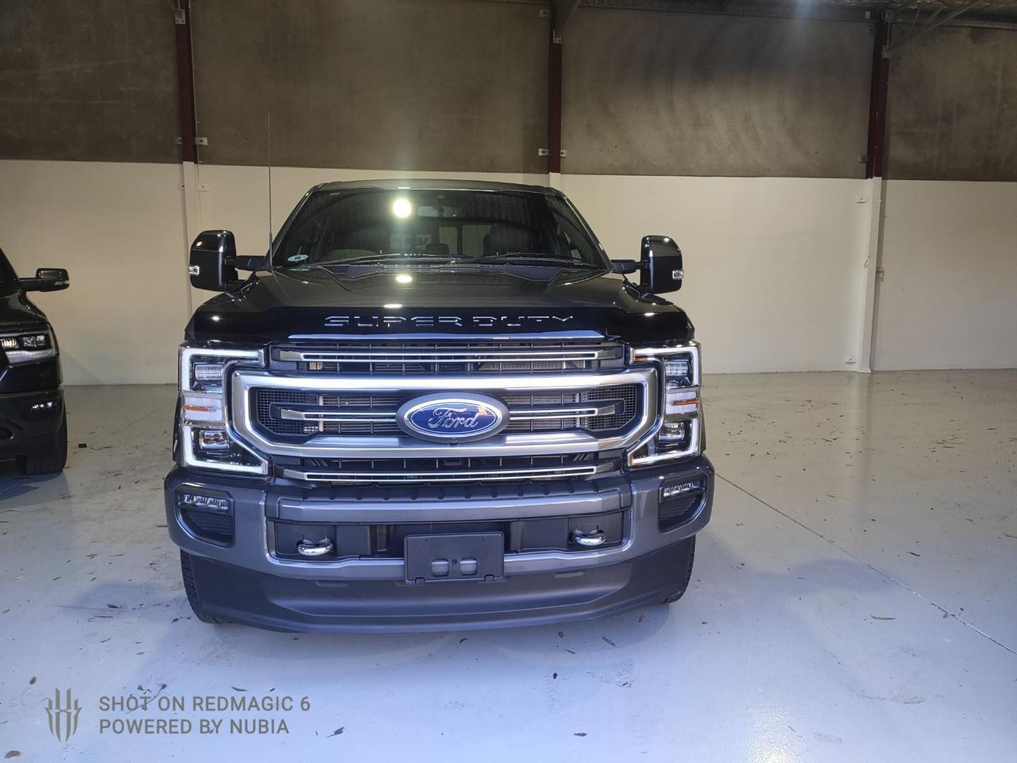 Black Ford Pickup Truck Front View — Car Paint Protection in Newcastle
