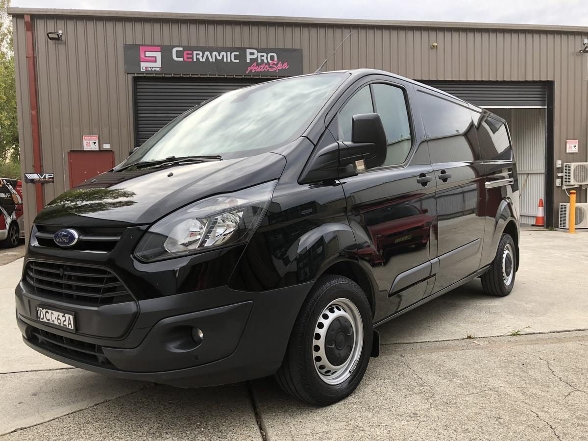 Shiny Black Van Parked in Front of Garage — VIP Car Care Newcastle in Hunter Valley, NSW