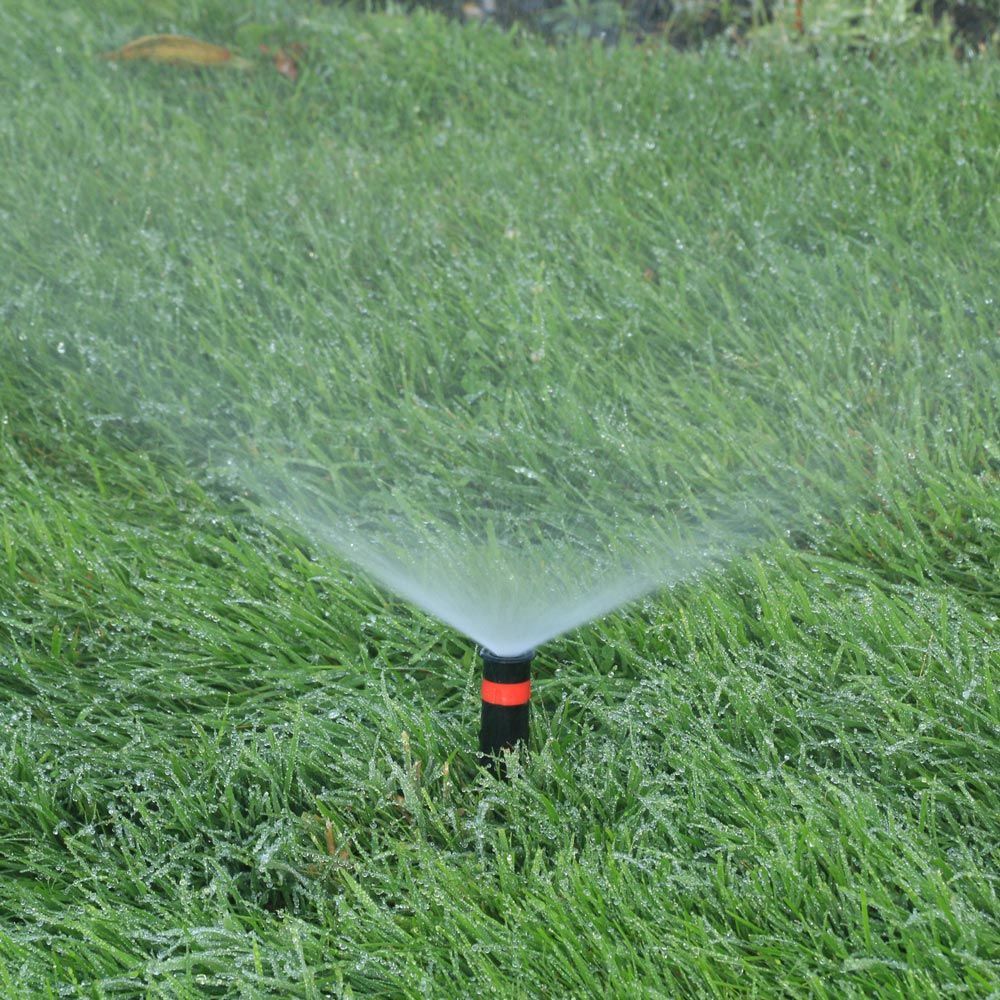 Sprinkler Spraying Water On Lawn — LaSalle, ON — Yard-Worx