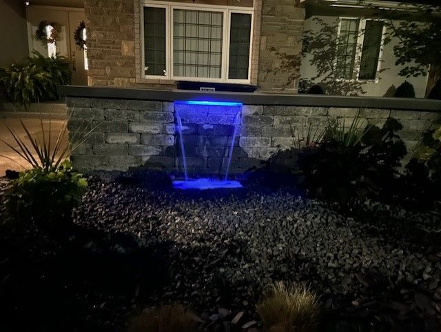 Outdoor Fountain At Night — LaSalle, ON — Yard-Worx