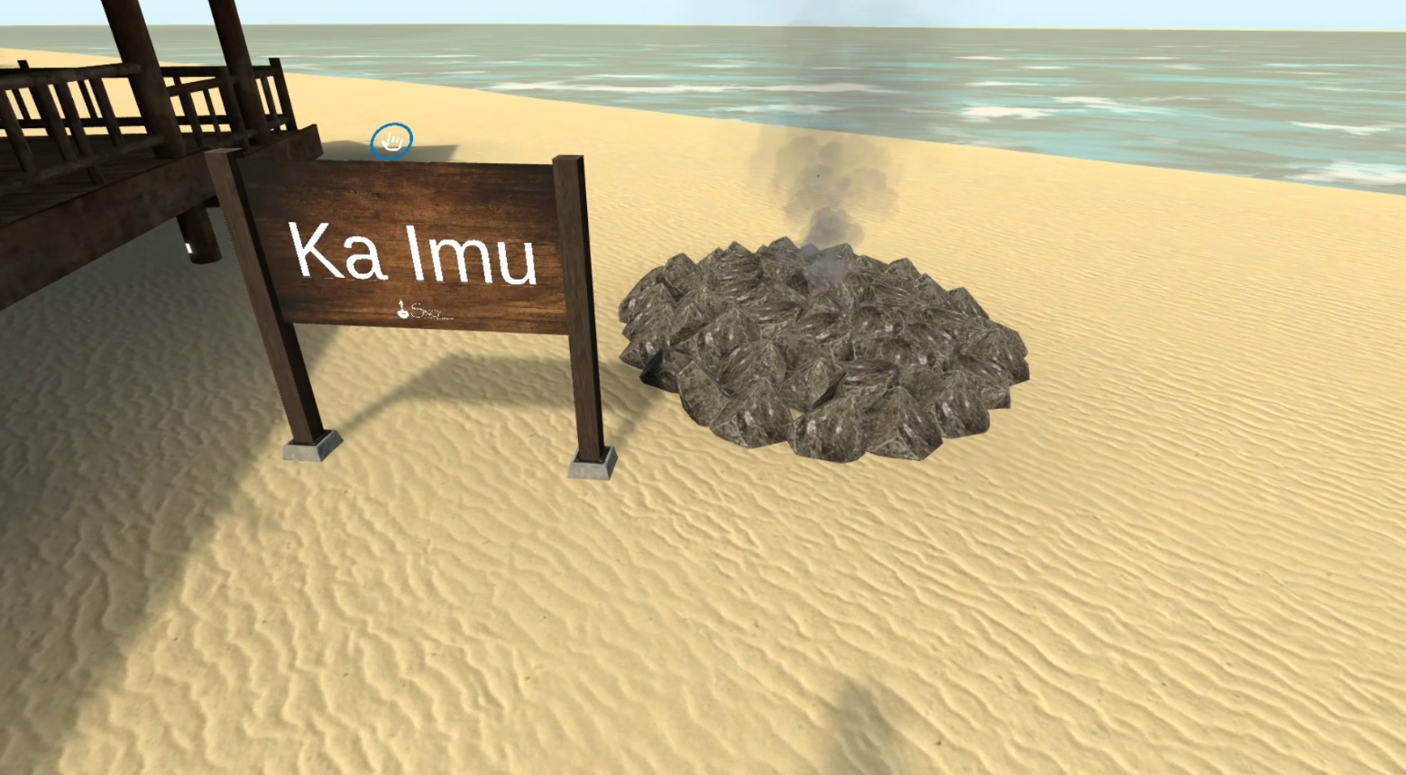 A sign on a sandy beach says ka imu
