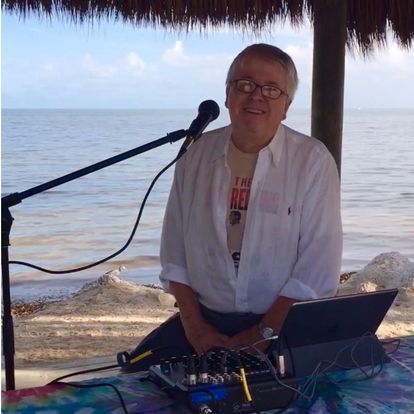 A man wearing a shirt that says i 'm a rebel
