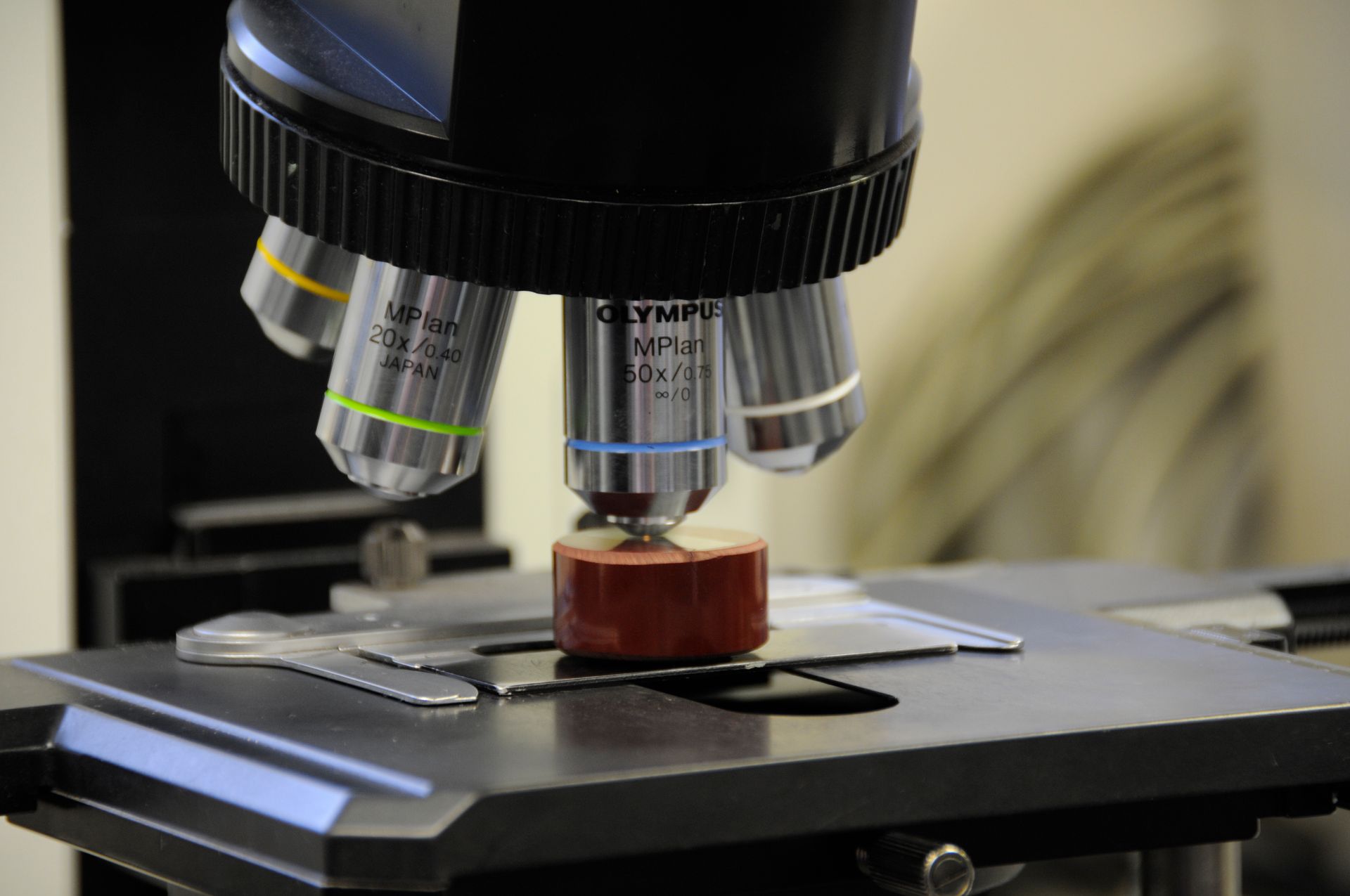 Microscope looking at metal object.