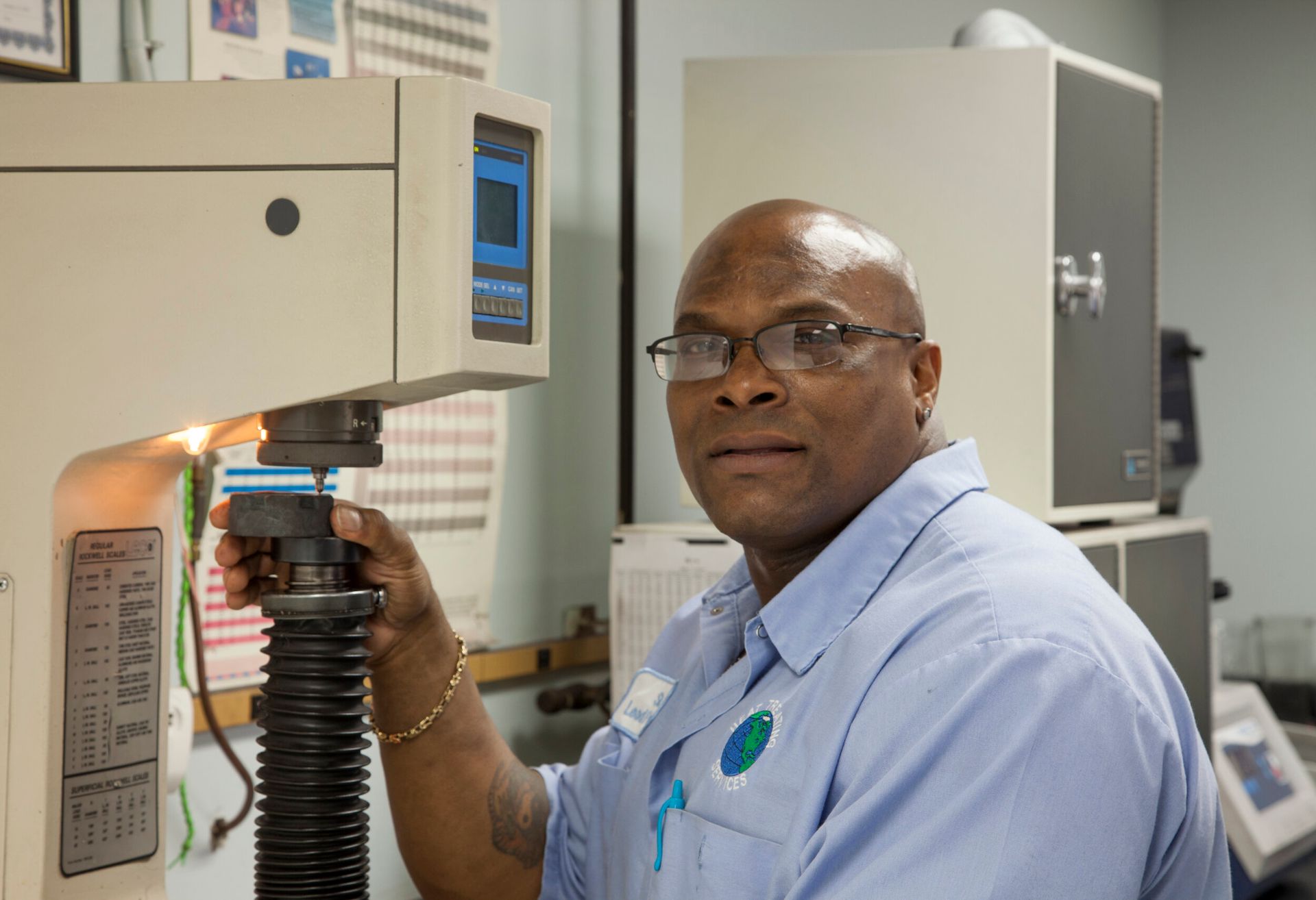 Man in office using machine.