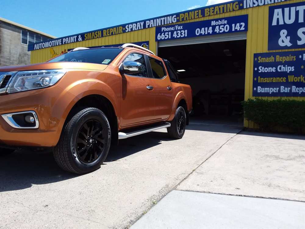 Orange car — Smash Repairs in Coffs Harbour, NSW