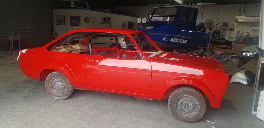 Red car restoration angle — Smash Repairs in Coffs Harbour, NSW