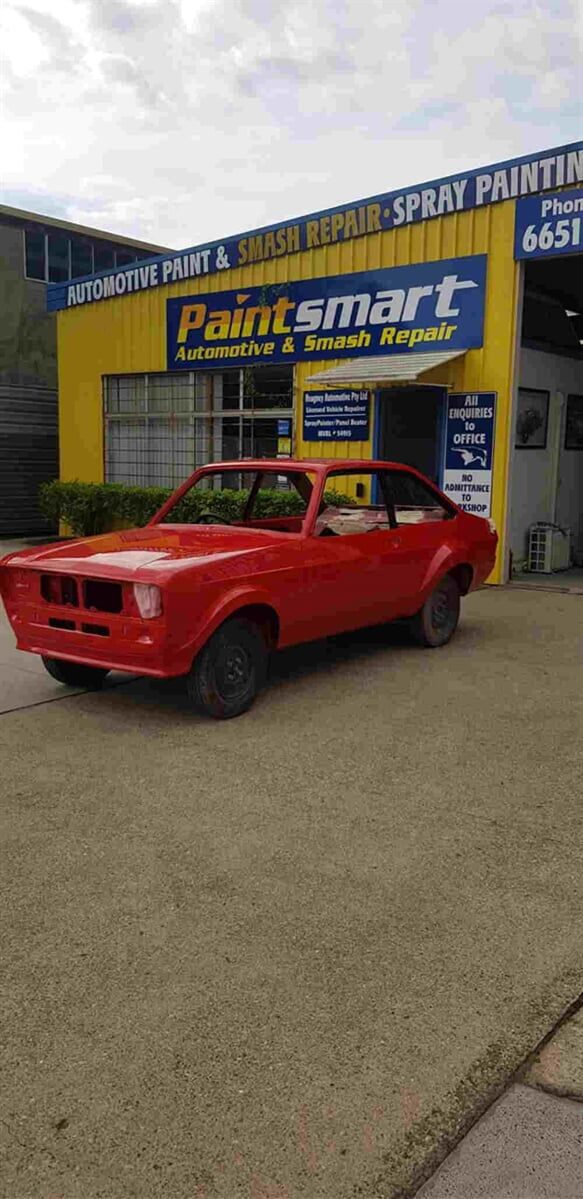 red car parked — Smash Repairs in Coffs Harbour, NSW