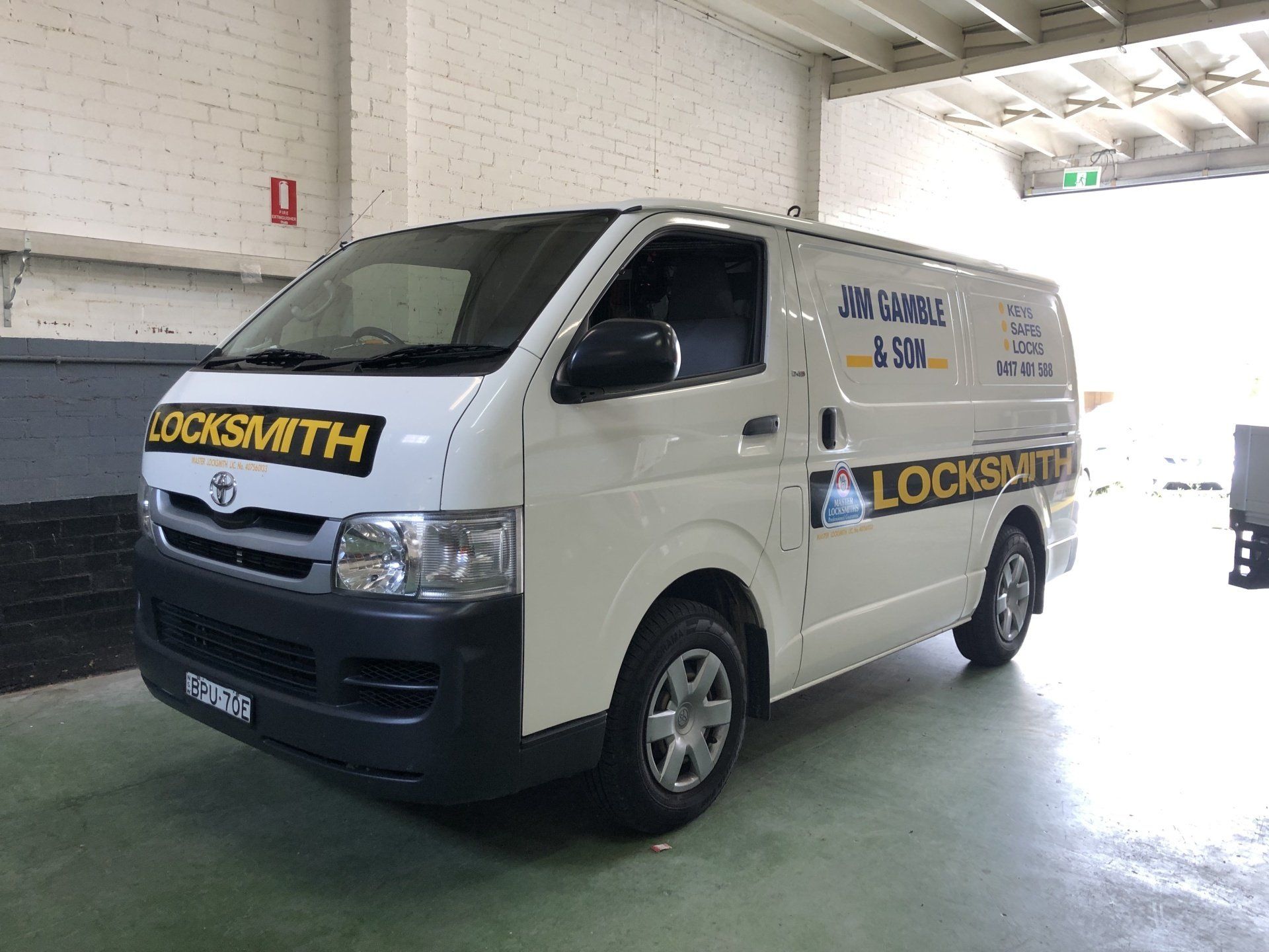 Company Van With Vehicle Signage — Locksmith in Lismore, NSW