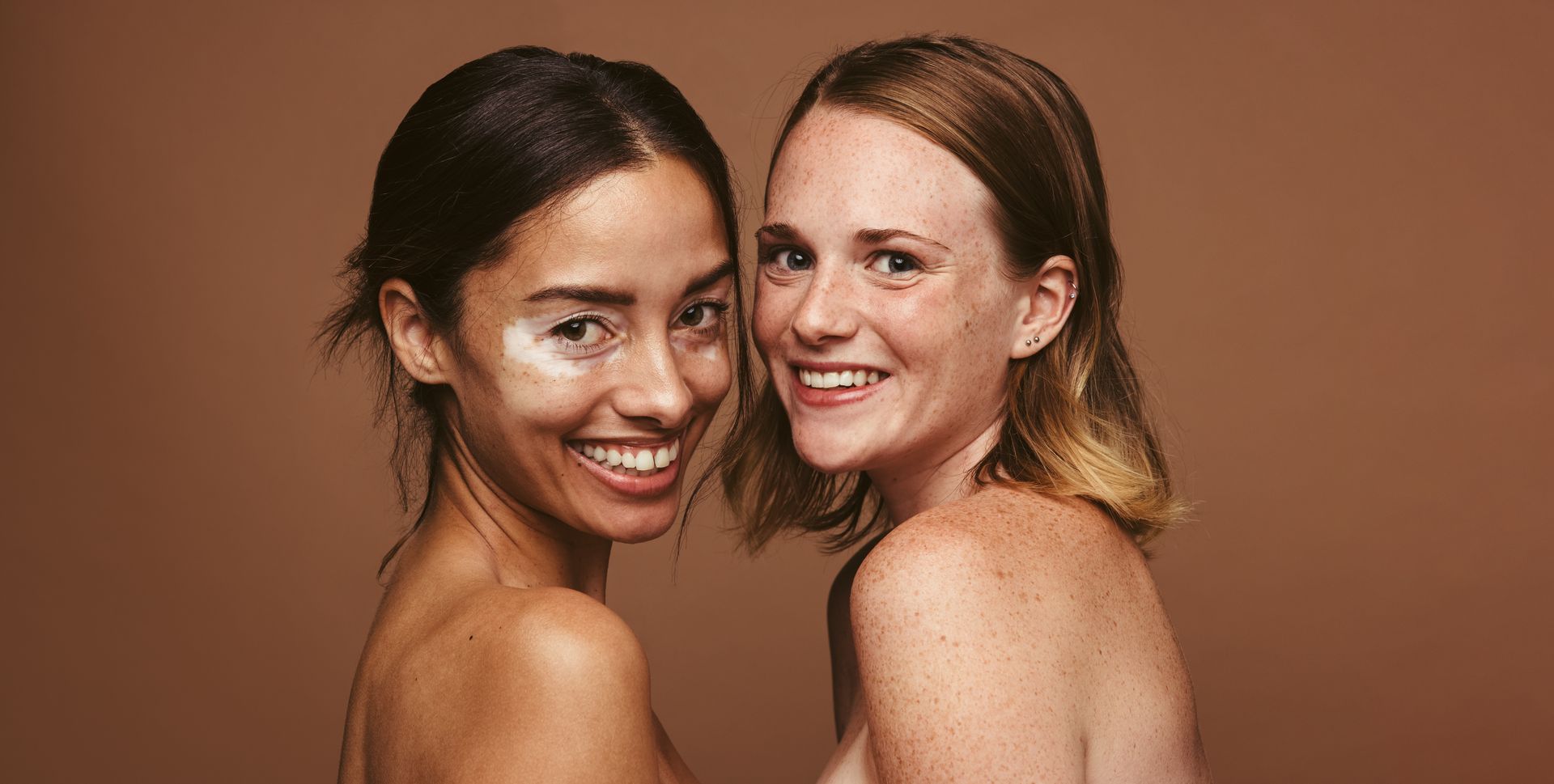 Two beautiful women smiling