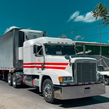 a man is working on a car engine with a wrench .