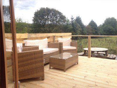 Deck seating at the Galloway Lodge Mega Pod at Queensland Holiday Park