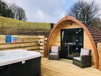 The Sun Rise Mega Pod decking area at Queensland Holiday Park