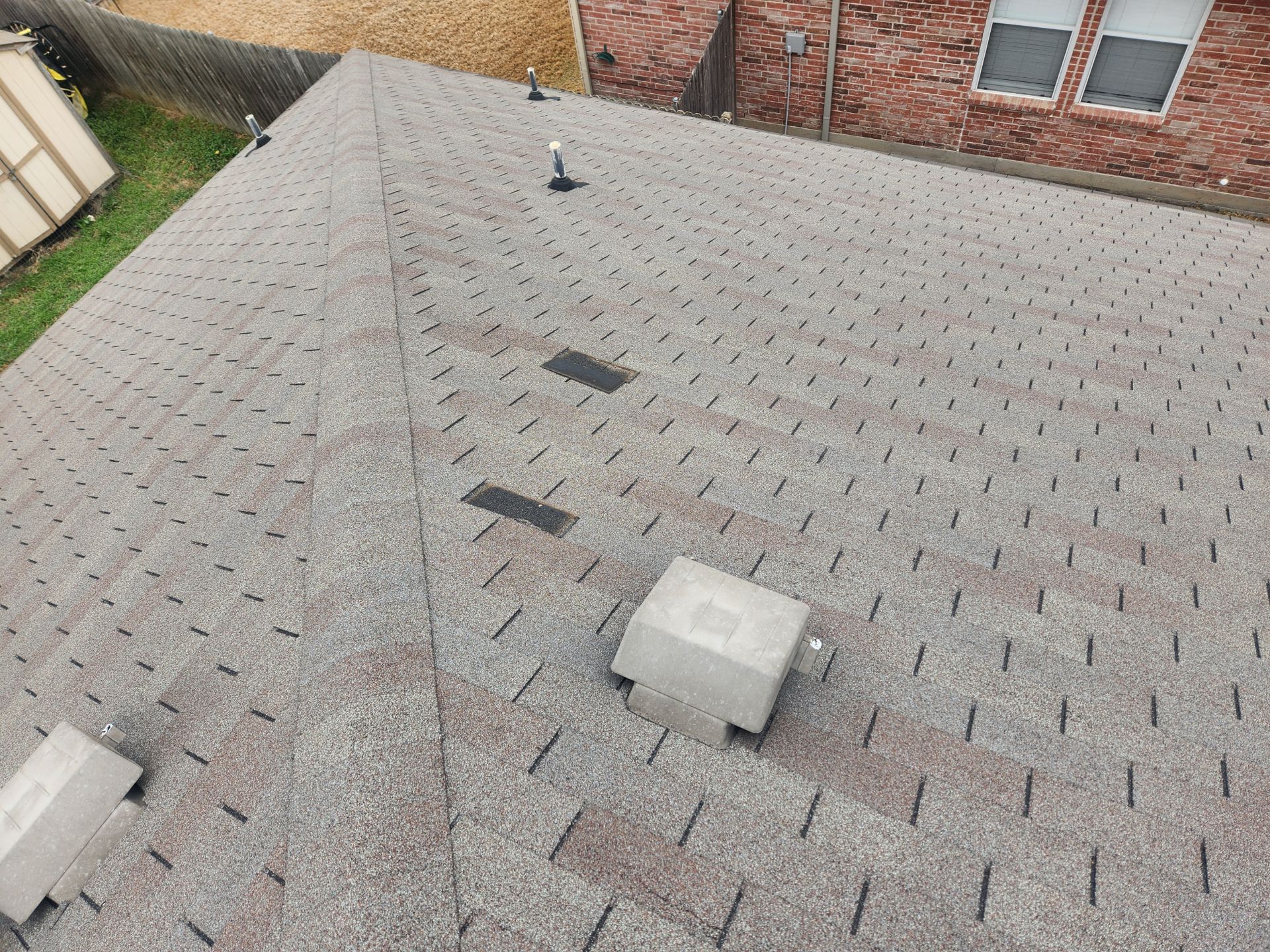 Modern residential home with premium roof installation by professional roofing contractors.